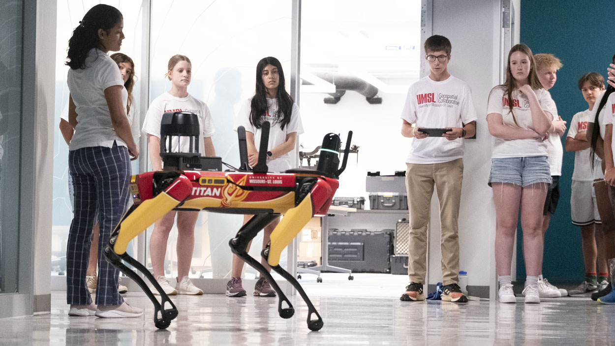AI dog with students